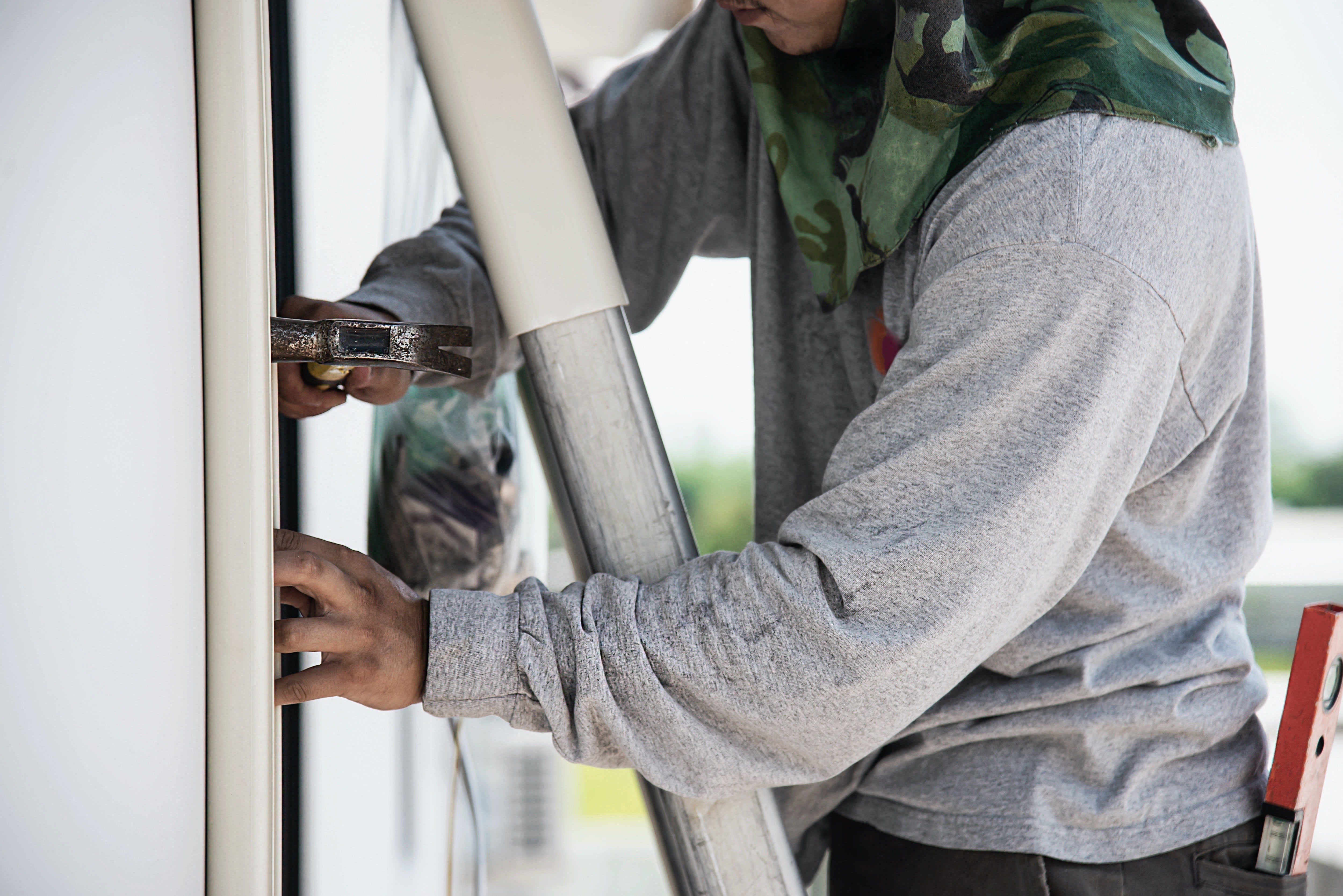 Maintenance technician reviewing recurring service schedule